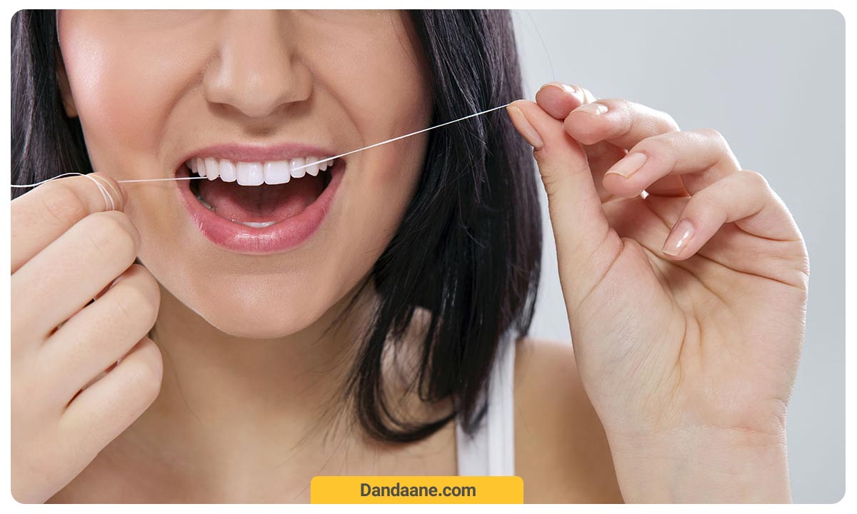 مراقبت از دهان و دندان با نخ دندان کشیدن
